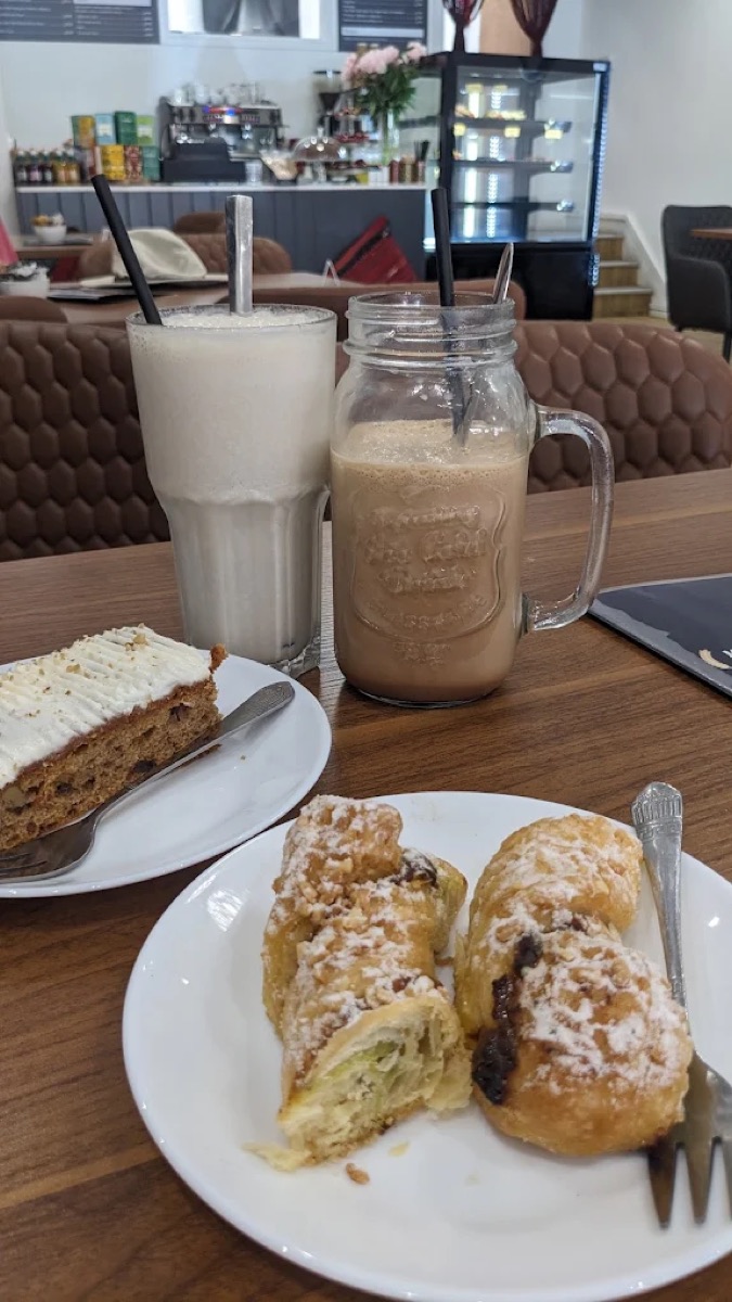 Carrot cake, pastries and iced coffees